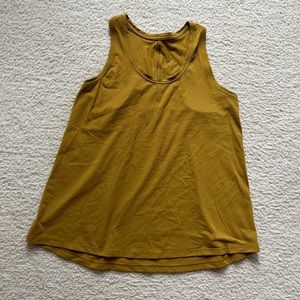 Lululemon train tank, mustardy yellow color size 6